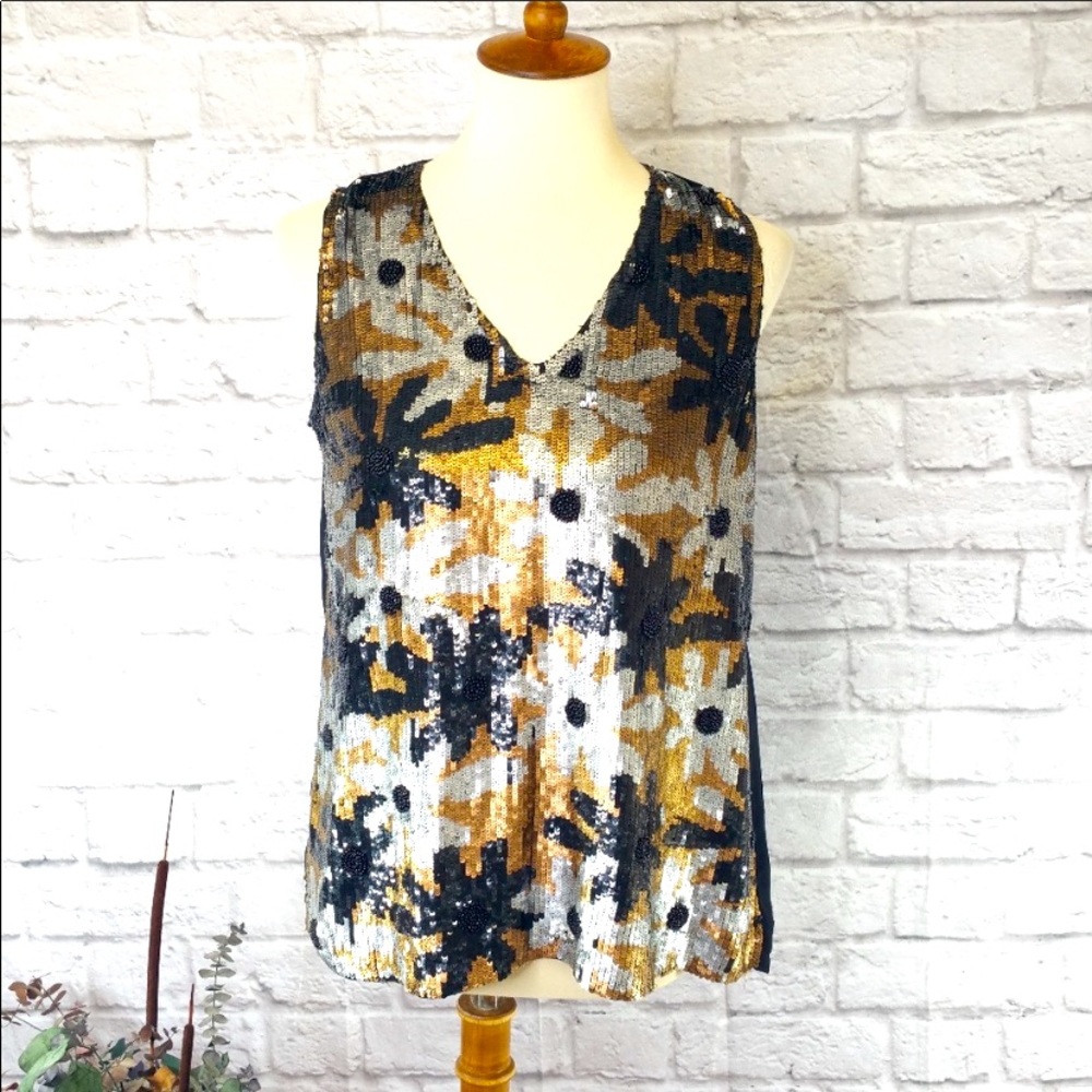 Perfect New Year’s Eve shirt.

Kay Celine  Matte Sequin Floral Tank Top SmLl